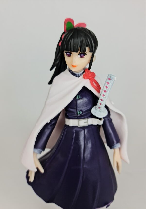 figurine of Kanao from demon slayer, front-facing