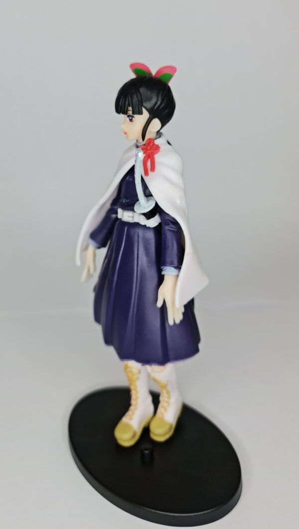 figurine of Kanao from demon slayer, side-facing