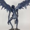 figurine of Ruyk from Death Note, floating and stretched wings, back view