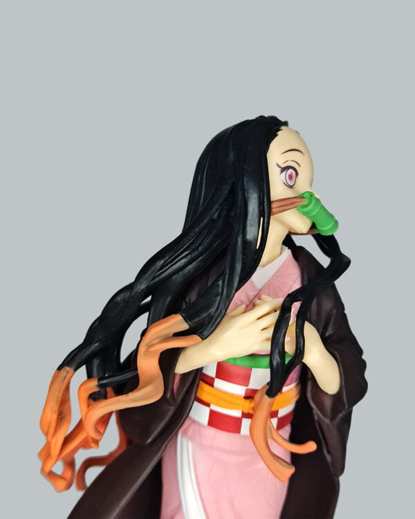 figurine of nezuko from Demon Slayer, closeup side